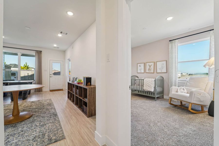 Representative furnished interior of a home built from the Margaux – Chateau Collection by Chesmar Homes in Bridgeland, Cypress (Image 17).