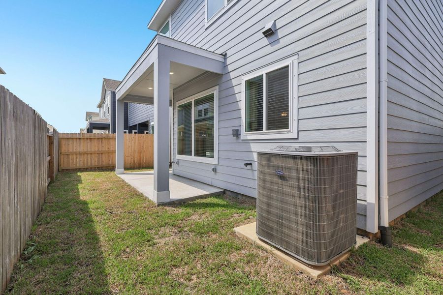 Exterior details and patio area of a home in Kemah Crossing - Luxe Series, Kemah (Image 4). Exterior details and patio area of a home in Kemah Crossing - Luxe Series, Kemah (Image 4).