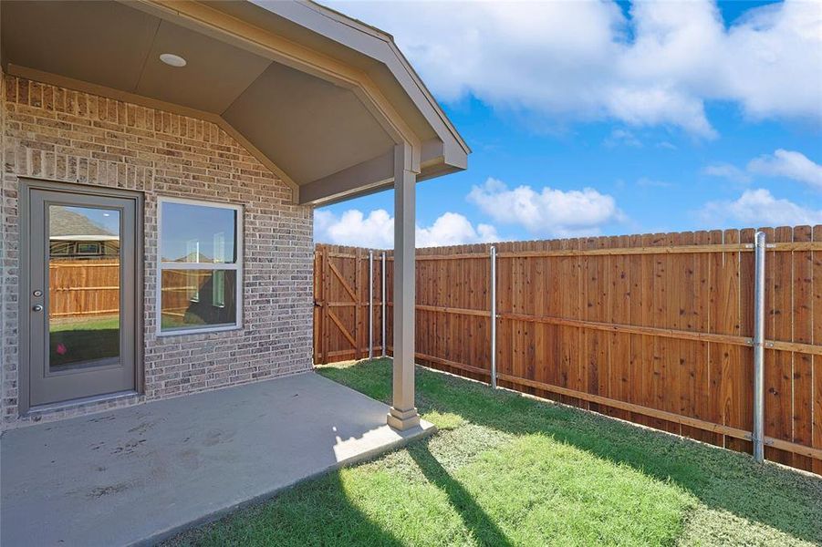 View of yard with a patio