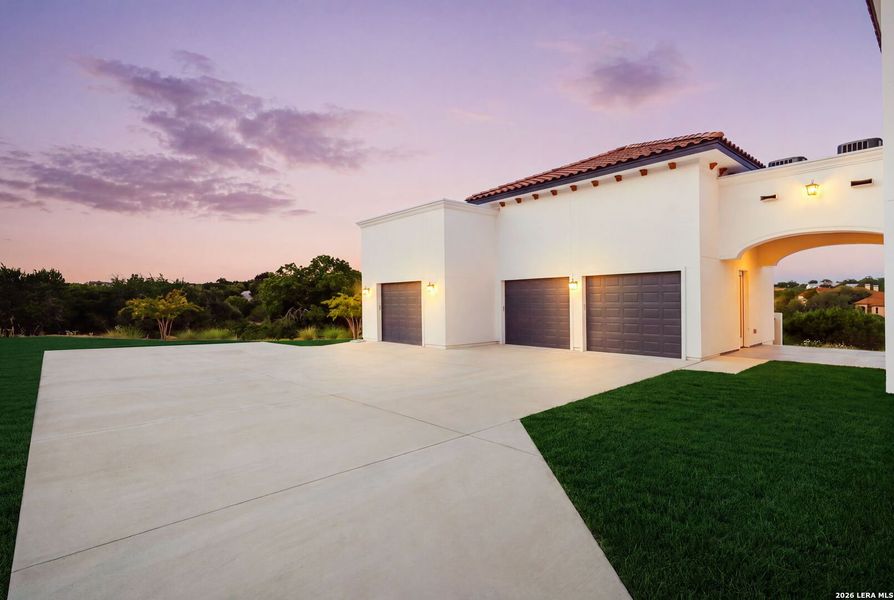 Front exterior of a new home in , Boerne, TX, highlighting curb appeal (Image 23).