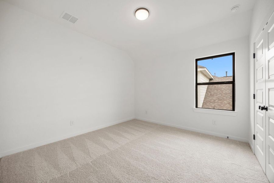 The third guest bedroom located upstairs.