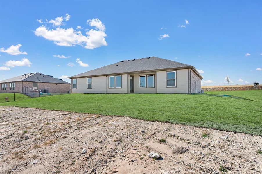 Exterior details and patio area of a home in Gatlin Ranch, Springtown (Image 23).