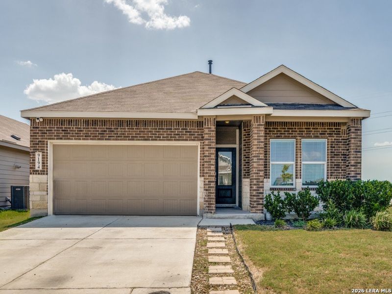 Front exterior of a new home in Navarro Ranch, Seguin, TX, highlighting curb appeal (Image 20).