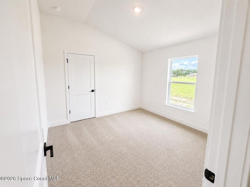 Spacious, unfurnished interior of a new home in St. John's Preserve, Palm Bay (Image 21).