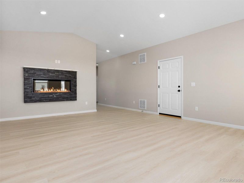 Living room with LTV flooring and fireplace! Living room with LTV flooring and fireplace!