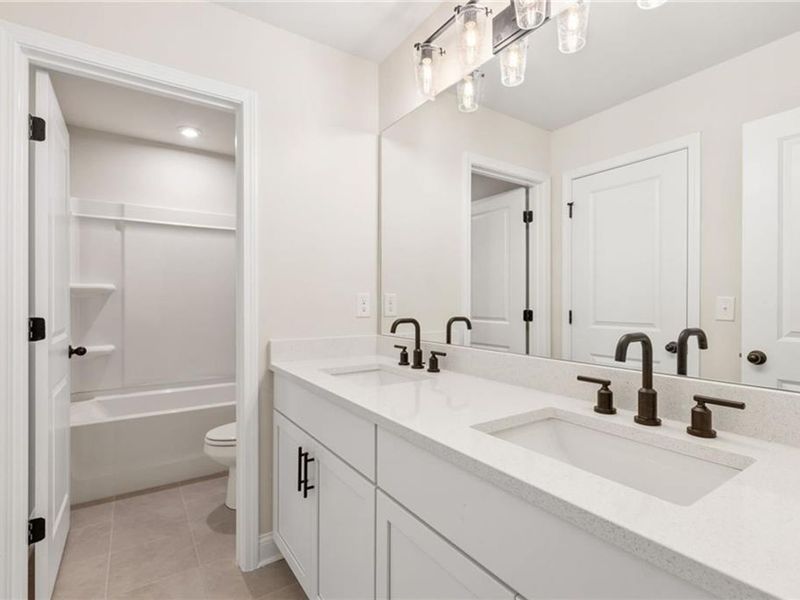 Furnished interior view inside a new home in Melody Lakeside Estates, Buford (Image 8).