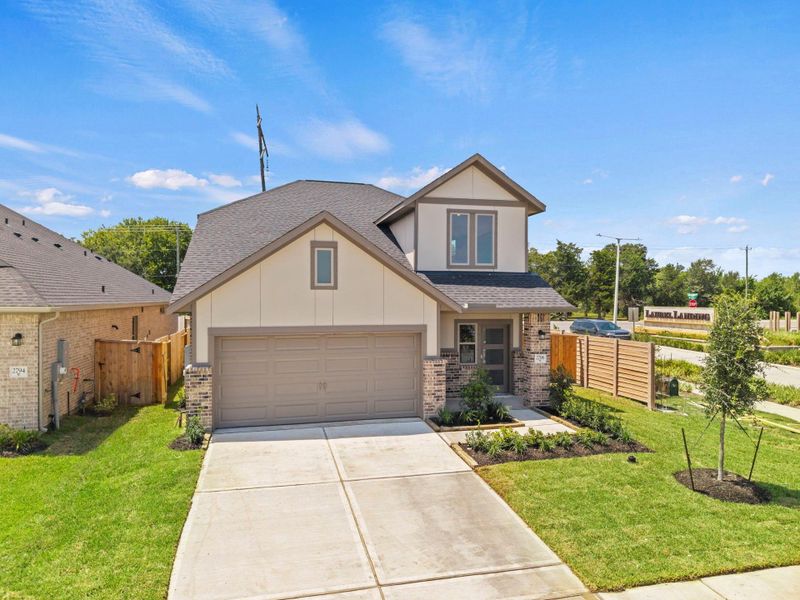 Front exterior of a new home in Laurel Landing, Alvin, TX, highlighting curb appeal (Image 18).