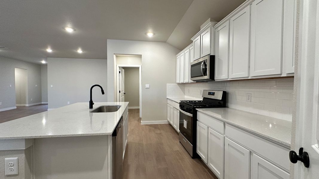 Furnished interior view inside a new home in The Lakes Northwest, Robstown (Image 12).