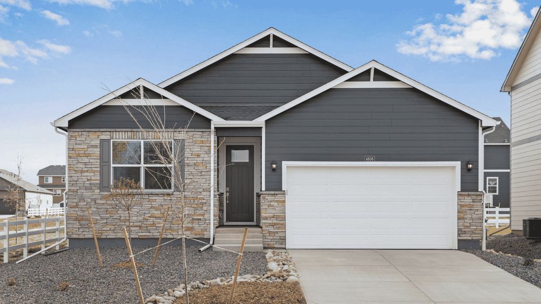 Front exterior of a new home in Westgate, Greeley, CO, highlighting curb appeal (Image 1). Front exterior of a new home in Westgate, Greeley, CO, highlighting curb appeal (Image 1).