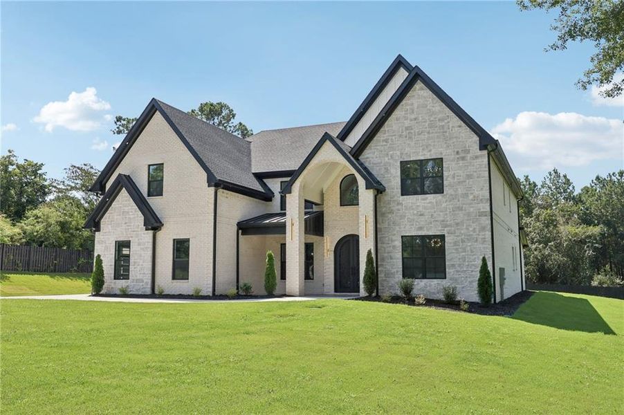 Front exterior of a new home in , Hoschton, GA, highlighting curb appeal (Image 35). Front exterior of a new home in , Hoschton, GA, highlighting curb appeal (Image 35).