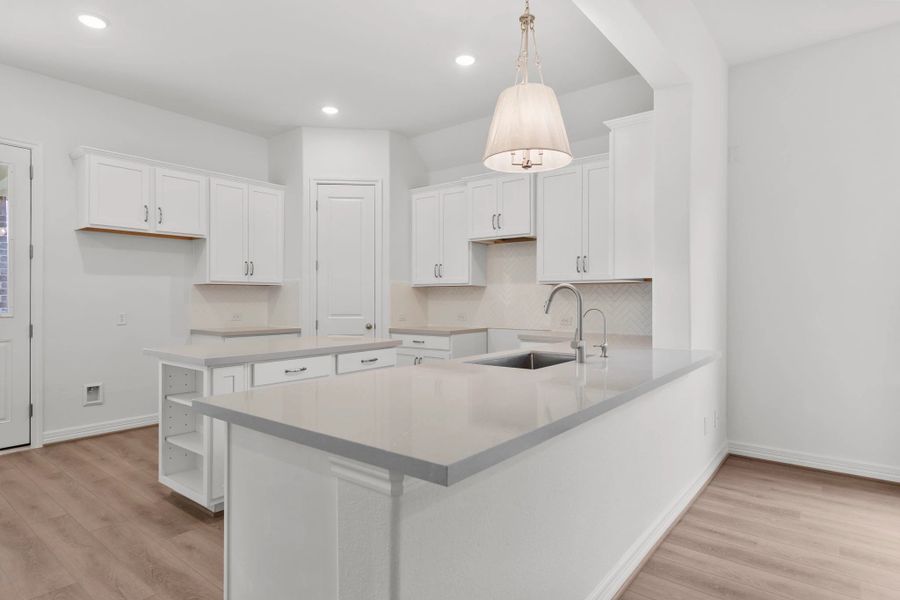Kitchen. Sample product photo. Actual exterior and interior selections may vary by homesite. Photo may be virtually staged.