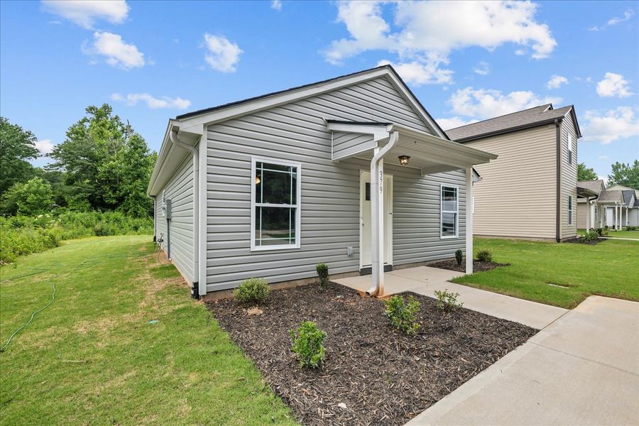 Representative exterior photo of a completed home built from the Elliott by Enchanted Homes in Gentry Place, Spartanburg, SC (Image 14).