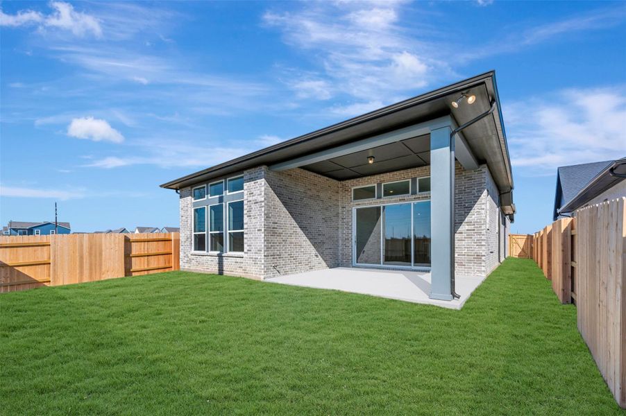 Exterior details and patio area of a home in Elyson - Reserve Collection, Katy (Image 25).