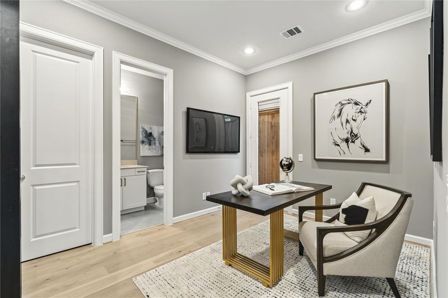 First floor bedroom with full bathroom. Perfect for home office or a guest room.