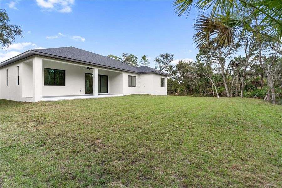 Exterior details and patio area of a home in , Port Charlotte (Image 3).