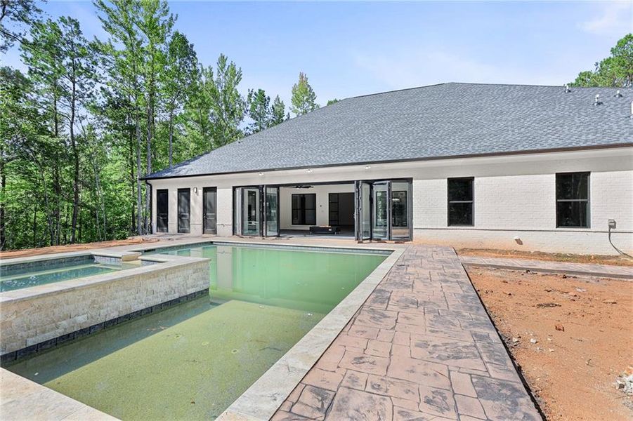 Exterior details and patio area of a home in , Chattahoochee Hills (Image 27).