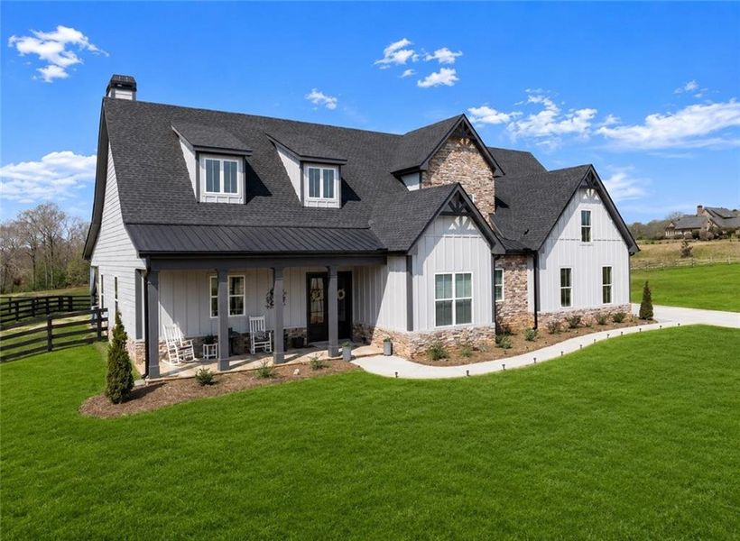 Front exterior of a new home in , Dawsonville, GA, highlighting curb appeal (Image 2). Front exterior of a new home in , Dawsonville, GA, highlighting curb appeal (Image 2).
