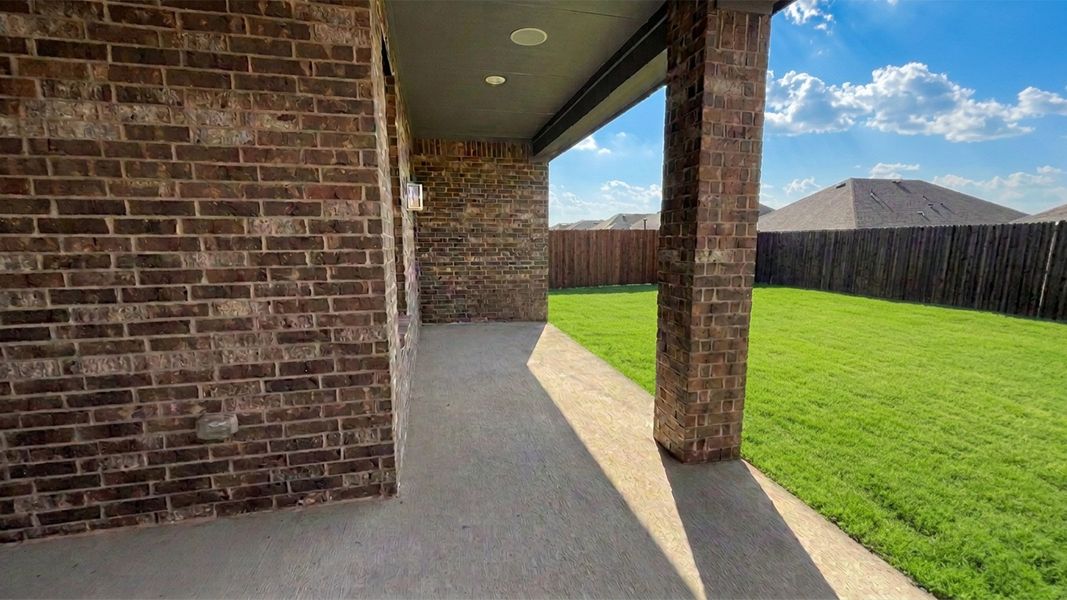 Exterior details and patio area of a home in Lakewood Trails, Forney (Image 3).