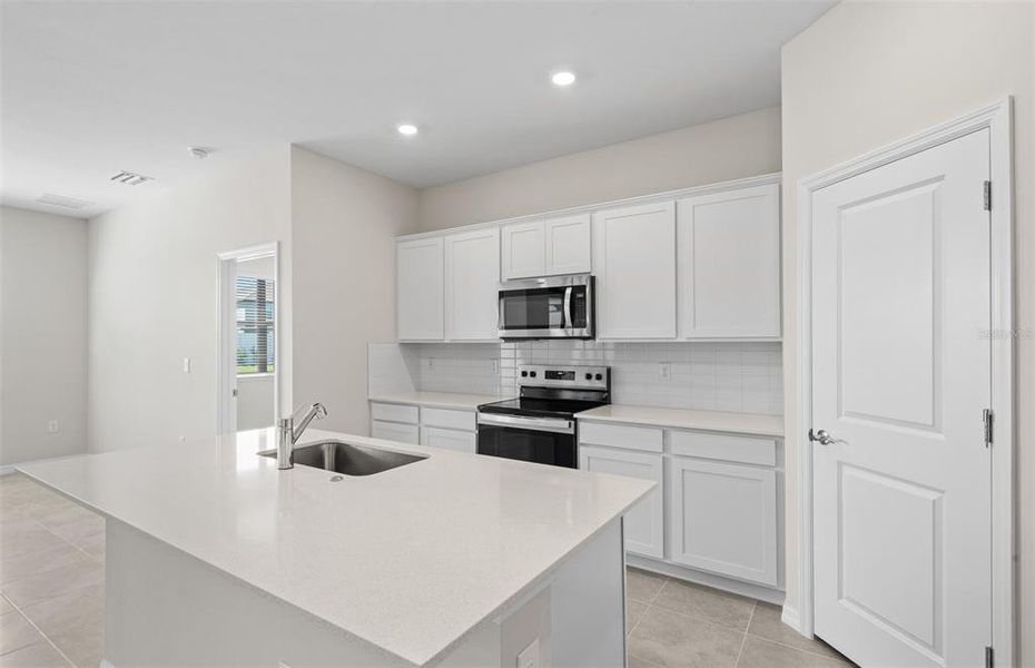 Furnished interior view inside a new home in The Strand at Cedar Grove, North Port (Image 4).