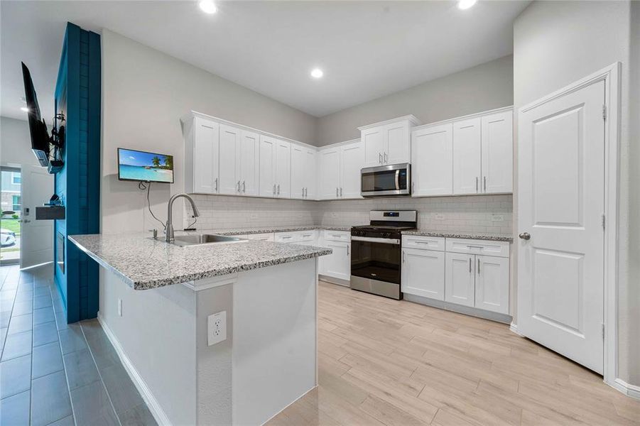 Furnished interior view inside a new home in Heritage Village, Haltom City (Image 5).