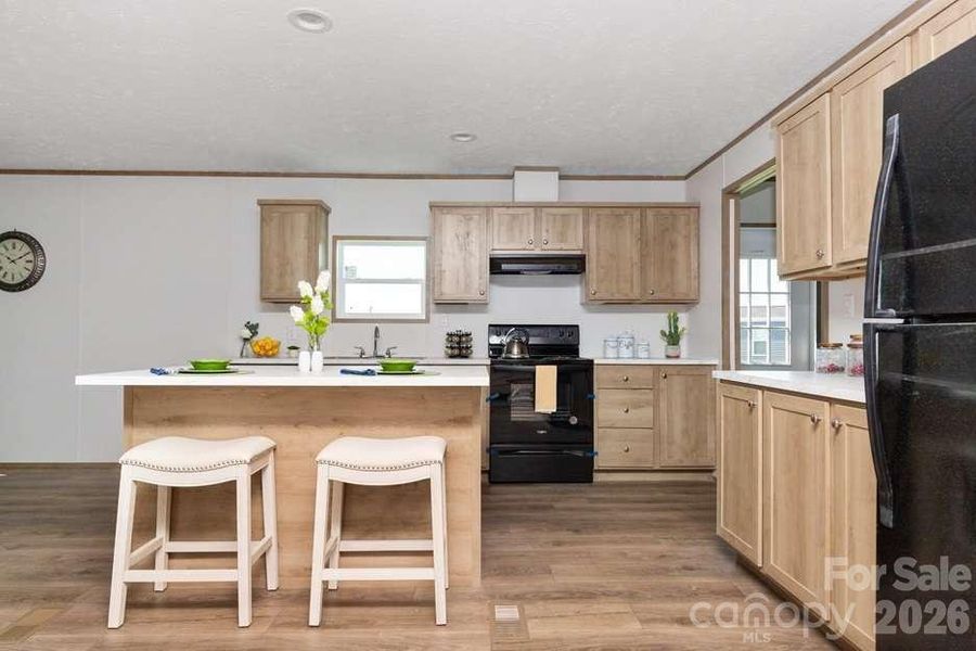 Furnished interior view inside a new home in , Newton (Image 11).