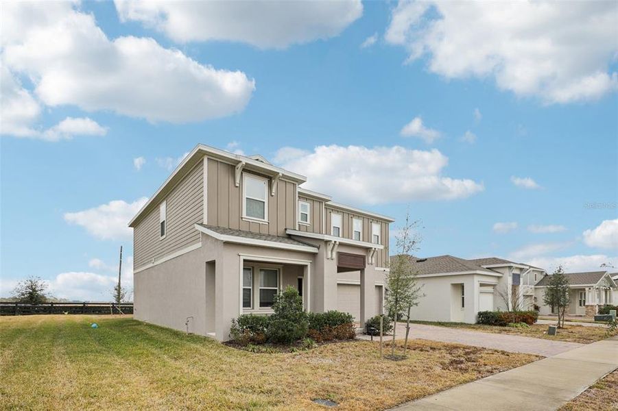 Front exterior of a new home in , Apopka, FL, highlighting curb appeal (Image 26).