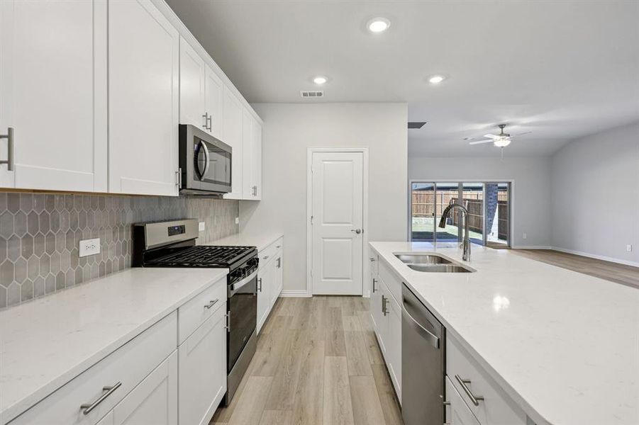 Photo is not of the actual home, but is an inspirational photo of builder’s model home and may depict options, furnishings, and/or decorator features that are not included.