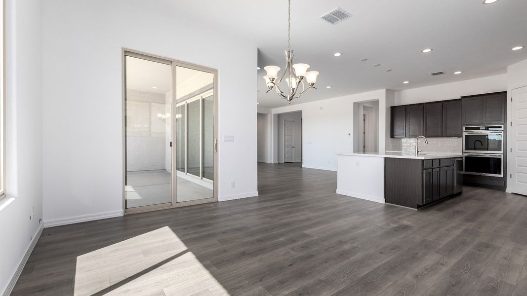 Furnished interior view inside a new home in Windrose, Waddell (Image 14).