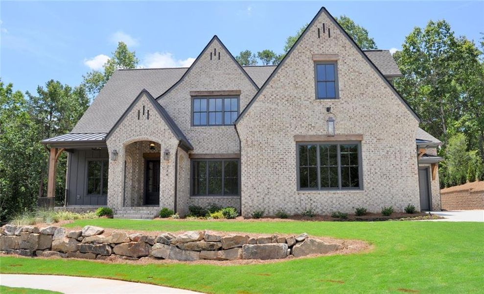 Front exterior of a new home in Woodford, Acworth, GA, highlighting curb appeal (Image 21).