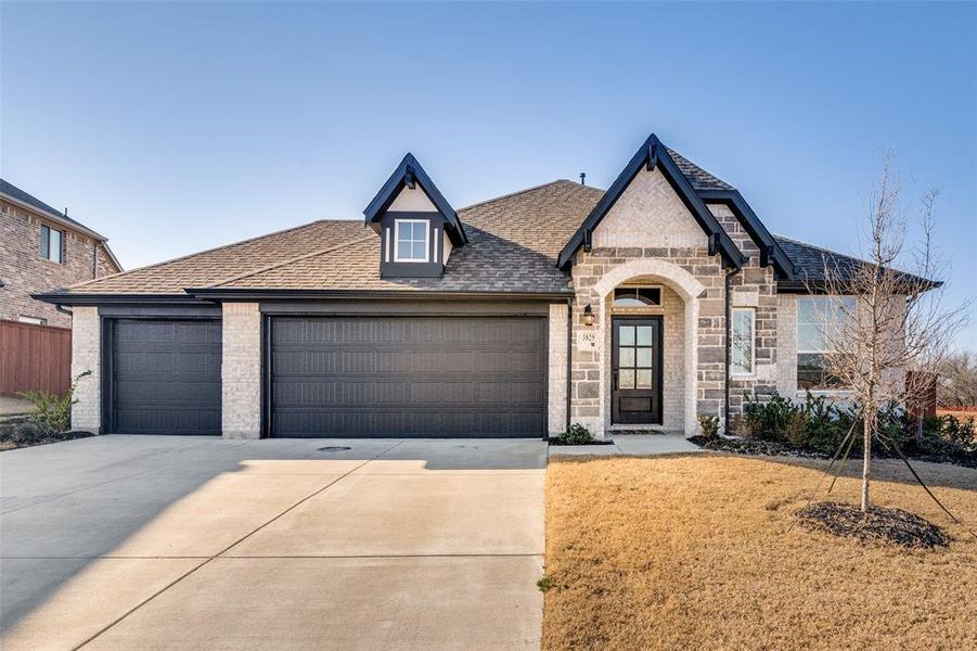 Front exterior of a new home in , Crandall, TX, highlighting curb appeal (Image 2). Front exterior of a new home in , Crandall, TX, highlighting curb appeal (Image 2).