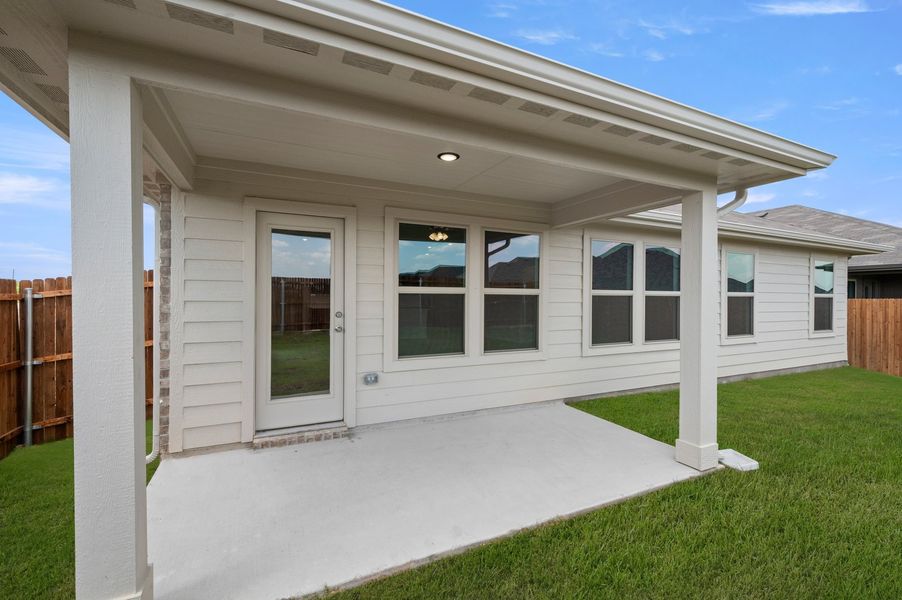 Front exterior of a new home in Terra Vella, Haslet, TX, highlighting curb appeal (Image 26). Front exterior of a new home in Terra Vella, Haslet, TX, highlighting curb appeal (Image 26).