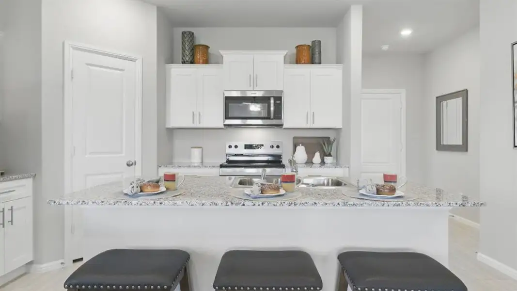 Kitchen- All Home and community information, including pricing, included features, terms, availability and amenities, are subject to change at any time without notice or obligation. All Drawings, pictures, photographs, video, square footages, floor plans, elevations, features, colors and sizes are approximate for illustration purposes only and will vary from the homes as built.