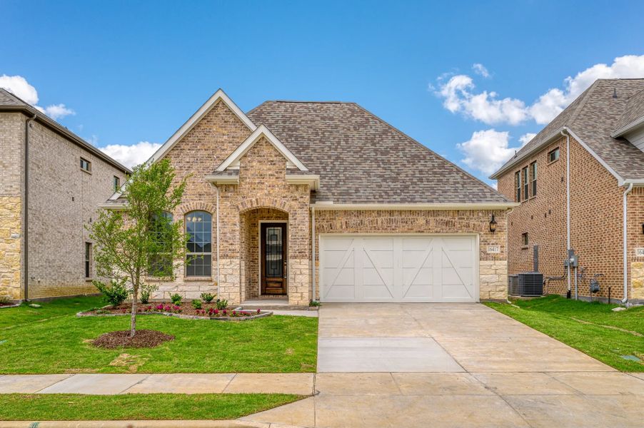 Representative exterior photo of a completed home built from the Ashlar by Stonehollow Homes in Heritage Grove, Blue Ridge, TX (Image 24).