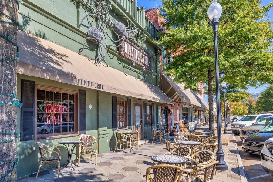 Front exterior of a new home in Pinegate, Covington, GA, highlighting curb appeal (Image 22). Front exterior of a new home in Pinegate, Covington, GA, highlighting curb appeal (Image 22).