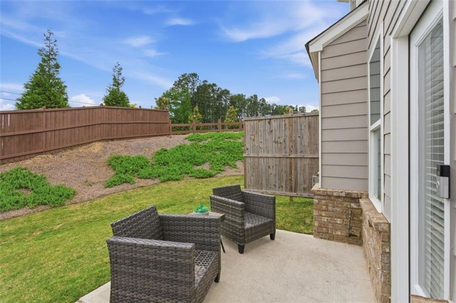 Exterior details and patio area of a home in Park Center Pointe, Mableton (Image 4).