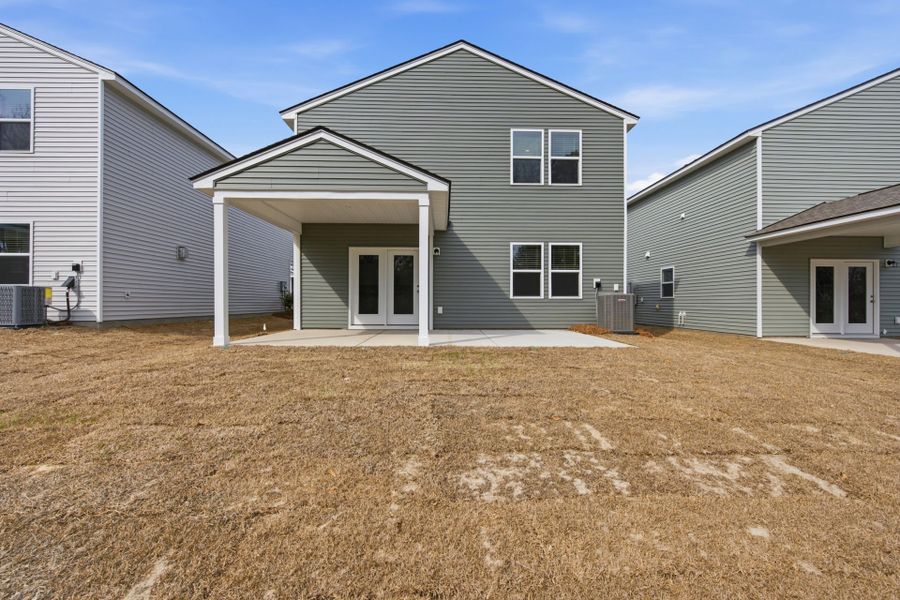 Exterior details and patio area of a home in Grand Arbor, Blythewood (Image 4).