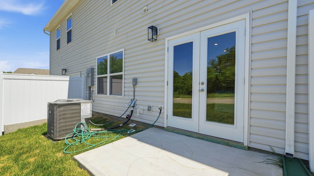 Exterior details and patio area of a home in The Arbor Townhomes, Kingsport (Image 4).