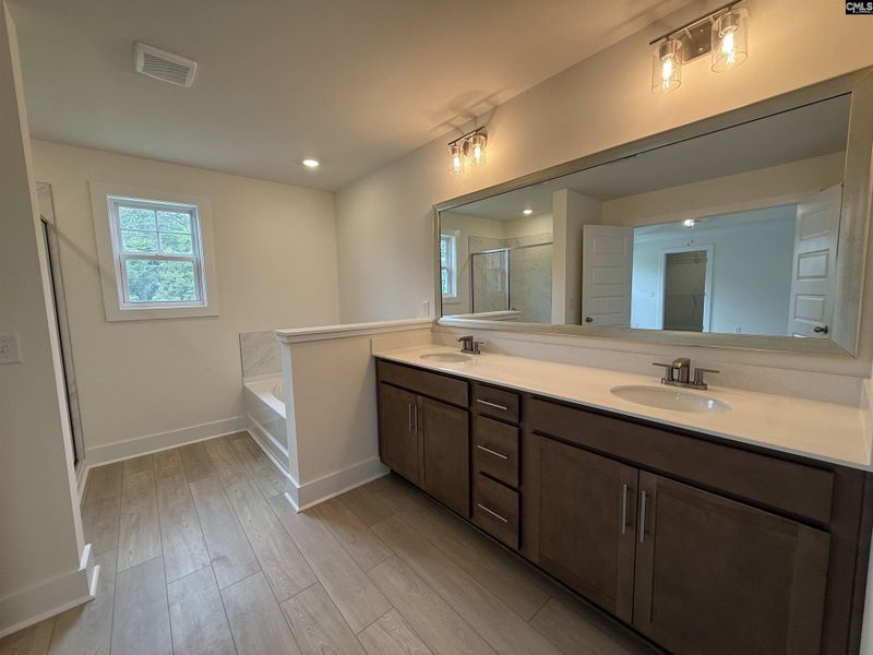 Furnished interior view inside a new home in Cottages at Roofs Pond, West Columbia (Image 10).