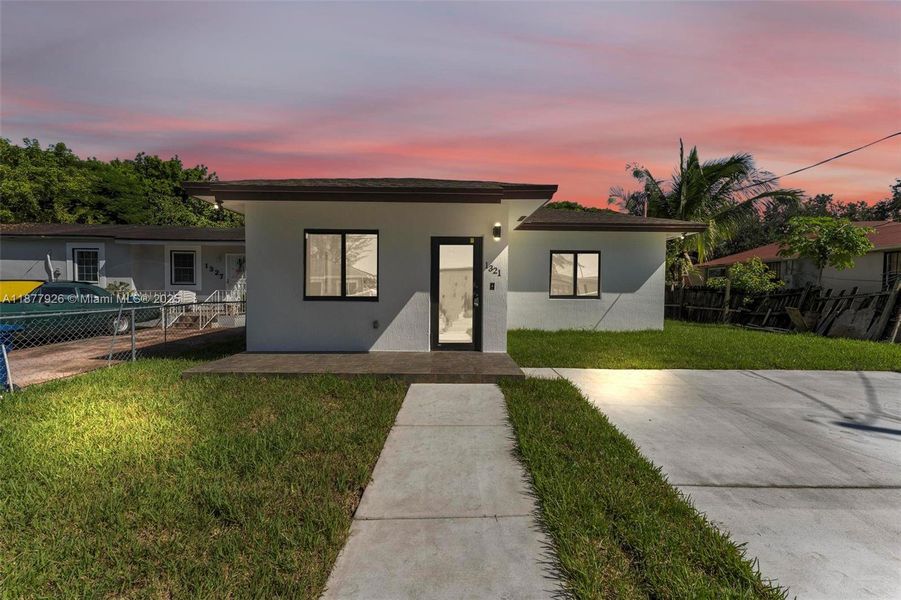 Front exterior of a new home in , Miami, FL, highlighting curb appeal (Image 19).