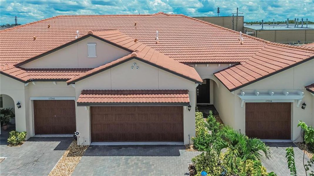 Front exterior of a new home in Southshore Bay Active Adult, Wimauma, FL, highlighting curb appeal (Image 23).