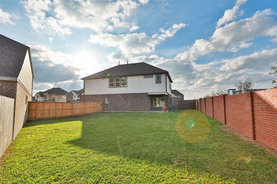 Exterior details and patio area of a home in Park at Eldridge, Sugar Land (Image 2). Exterior details and patio area of a home in Park at Eldridge, Sugar Land (Image 2).