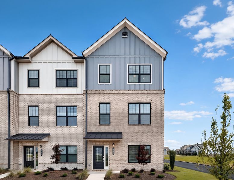 Front exterior of a new home in The Encore, Perry, GA, highlighting curb appeal (Image 1). Front exterior of a new home in The Encore, Perry, GA, highlighting curb appeal (Image 1).