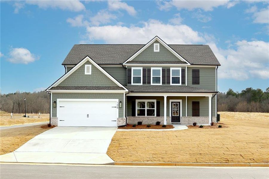 Front exterior of a new home in Harmony Farms, Eatonton, GA, highlighting curb appeal (Image 2).