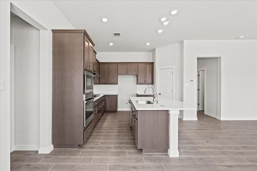 Furnished interior view inside a new home in Trace, San Marcos (Image 13).