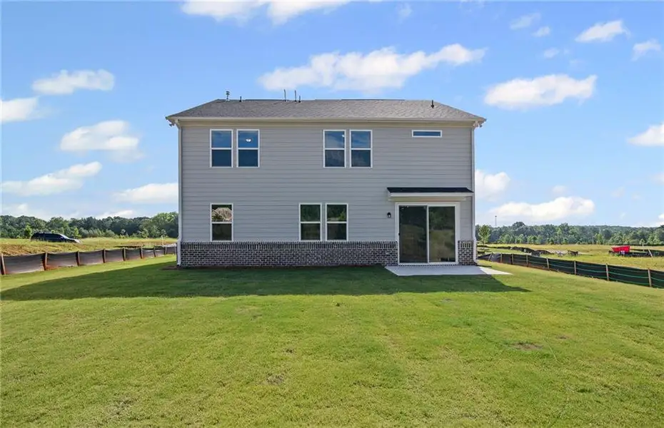 Exterior details and patio area of a home in Overland, Locust Grove (Image 3).