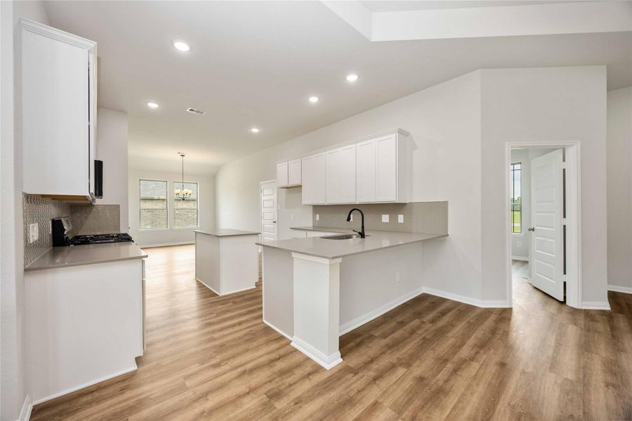 The kitchen island is the ideal space for additional seating for quick snacks or entertaining. The kitchen island is the ideal space for additional seating for quick snacks or entertaining.