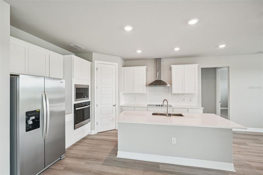 Furnished interior view inside a new home in Crescent Lakes - Signature Series, Punta Gorda (Image 9).
