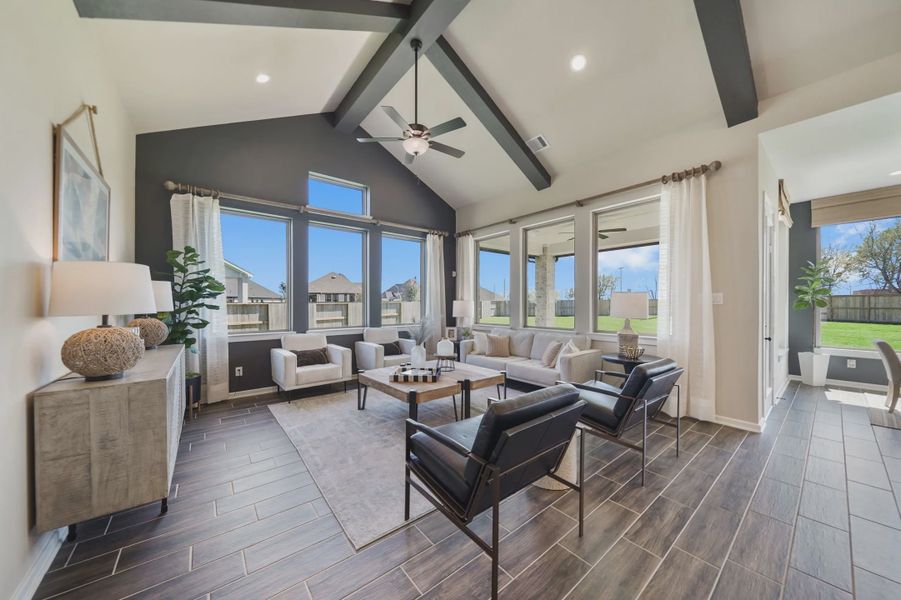 Representative furnished interior of a home built from the Montgomery by Chesmar Homes in Meridiana 50's and 60's, Manvel (Image 7).