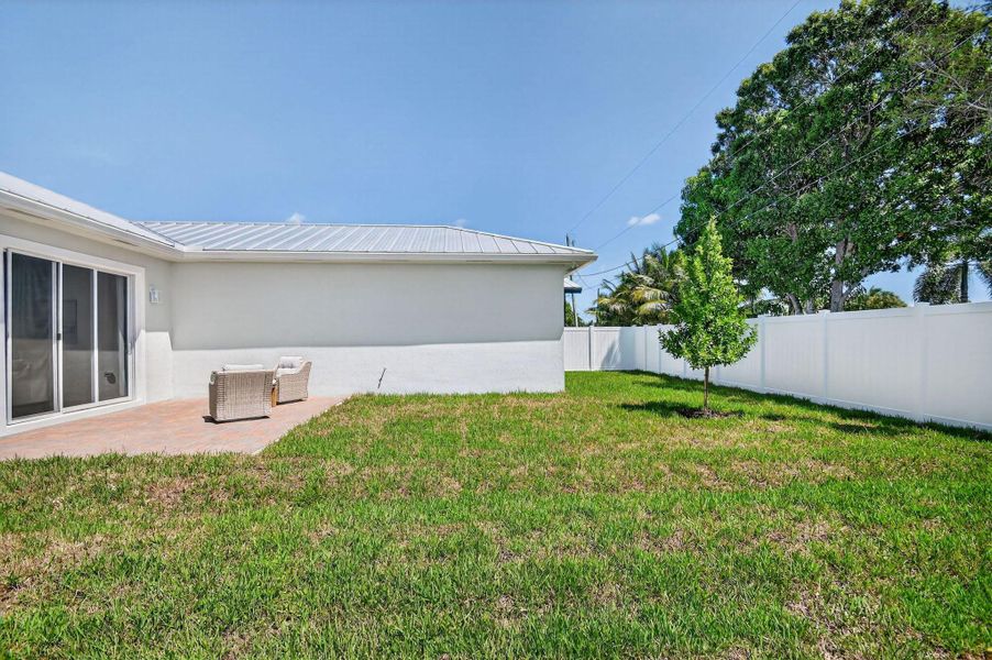 Front exterior of a new home in , Jupiter, FL, highlighting curb appeal (Image 20).