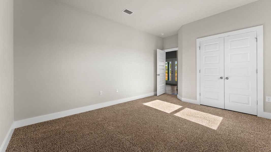 Representative unfurnished interior of a home built from the The Mckenzie by D.R. Horton in Liberty, Panama City (Image 33).